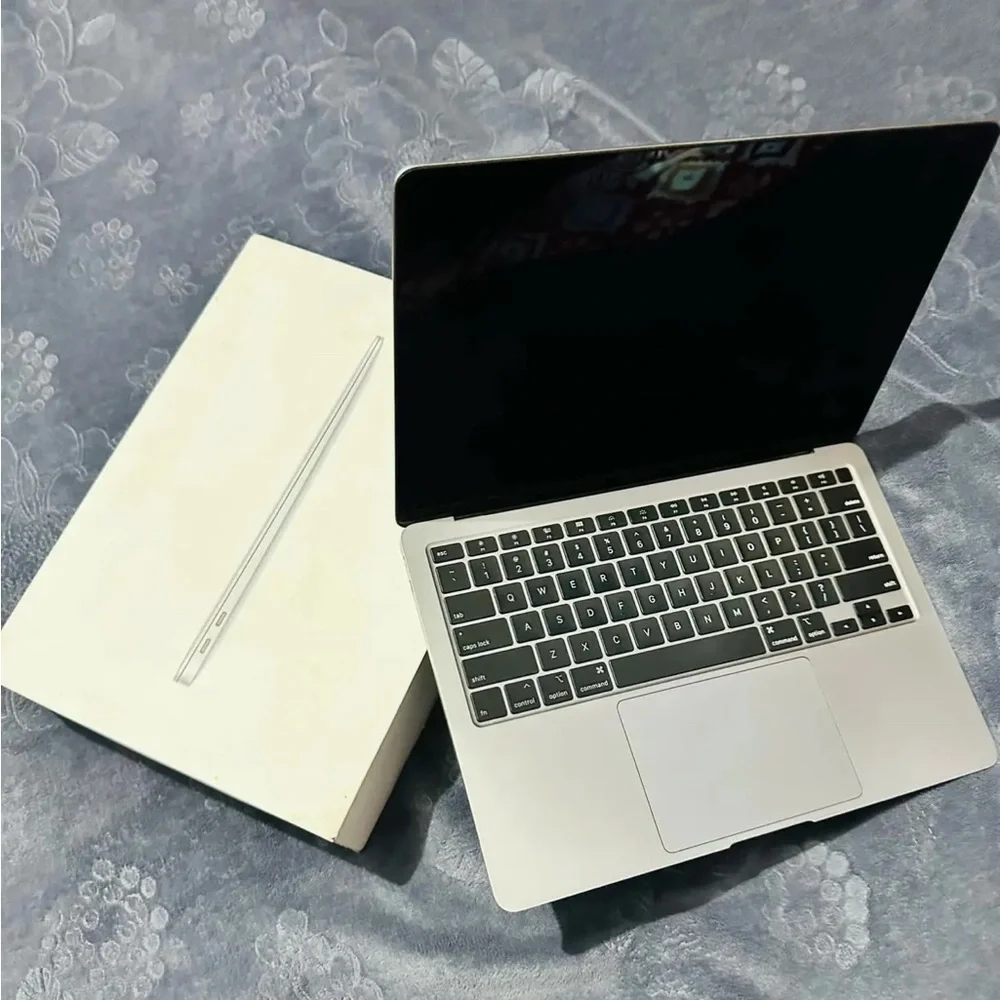 Apple Laptop in Silver with Black Keyboard